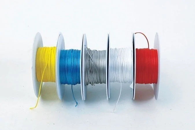 Bobine FIL A SURLIER DYNEEMA© - Ø0,83mm - 4 couleurs - jaune - bleu - blanc - gris